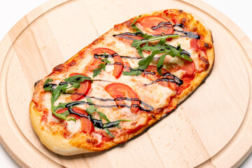 Delicious pizza served on wooden plate. Concept for advertising flyer and poster for restaurants or pizzerias, template with delicious taste of pepperoni.