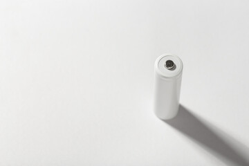AA size alkaline battery on a white background. Accumulator.