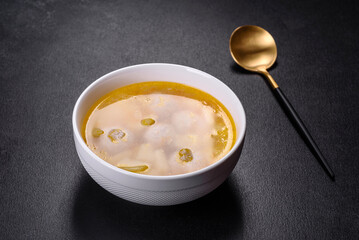 Soup with turkey meatballs, potatoes and vegetables. Selective focus