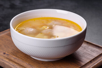 Soup with turkey meatballs, potatoes and vegetables. Selective focus