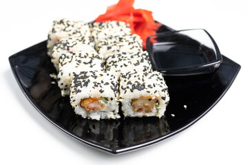 rolls, black plate, white background