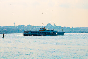 Istanbul background. A ferry and cityscape of Istanbul on the background.