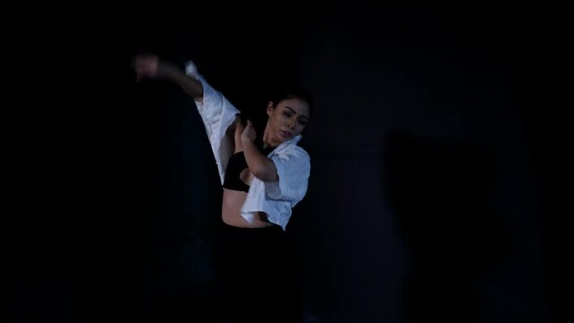 Young Latina Woman Dancing Whacking in Gorgeous Sensual Confident Eye Contact