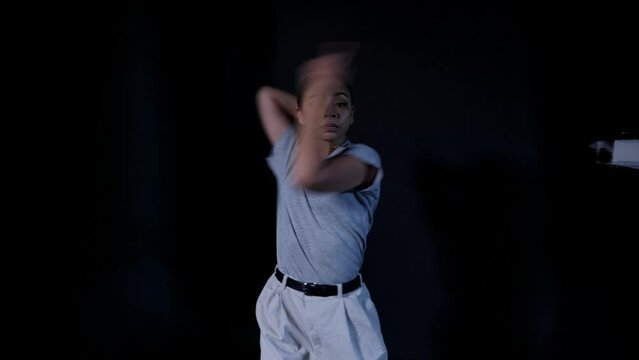 Young Latina in Gray Office Clothes Dancing Whacking Emotional Sensual Release Expression Contemporary