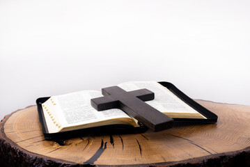 Holy Bible. Cross of Jesus, crucifixion. Our Easter is Christ. Open bible on the table. Prayer. resurrected resurrection