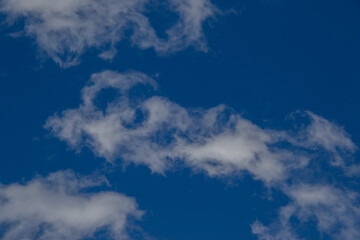 Cloudscape with shapes and faces image for background use