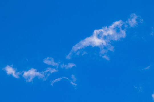 Cloudscape with shapes and faces image for background use