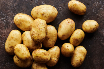 net potato tubers on a brown background