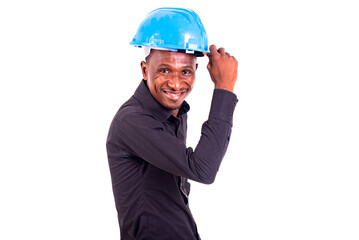 young man engineer wearing hard hat smiling.