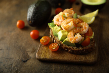 Shrimp toast with tomato and avocado