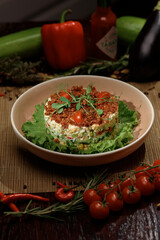 Vertical photography of served dish with salad.