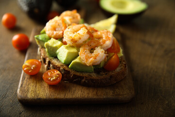 Shrimp toast with tomato and avocado