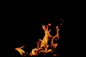 Close up burning flames on black background for graphic design or wallpaper