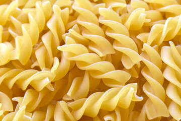 Fusilli pasta texture background.  Italian pasta background.