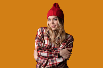 portrait of a beautiful caucasian young woman in a red cap