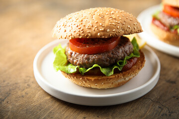 Traditional homemade burger with fresh tomato