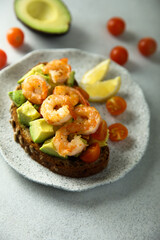 Shrimp toast with tomato and avocado