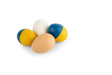 Easter egg blue and yellow on Ukraine flag colors as concept for war Ukraine