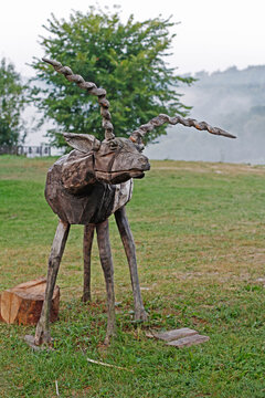 Nikola-Lenivets, Kaluga region, Russia - August 15, 2018: Wooden statue of deer as art object in art park "Nikola-Lenivets" in Kaluga region