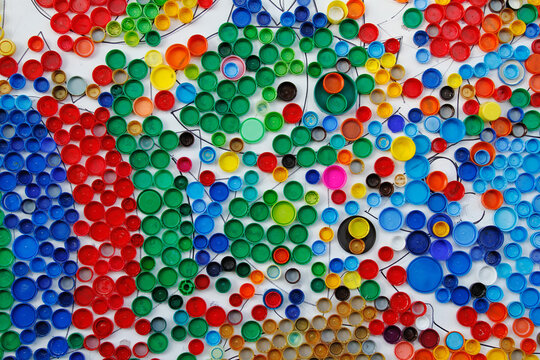 Colorful recycled plastic bottle caps as background or texture