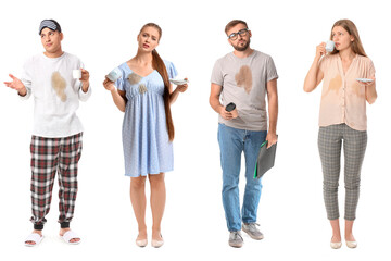Obraz premium Confused people with coffee stains on their clothes isolated on white