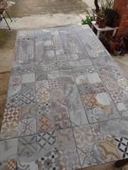 Grouting of Mosaic Tiled Table