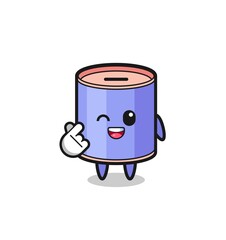 cylinder piggy bank character doing Korean finger heart