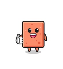 brick mascot doing thumbs up gesture