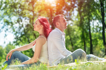 A young couple in the park.