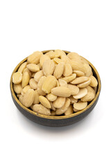 Peeled almond kernel isolated on white background. A bowl of almonds. close up