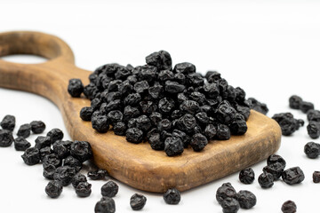 Dried blueberries isolated on a white background. Bulk blueberries. close up