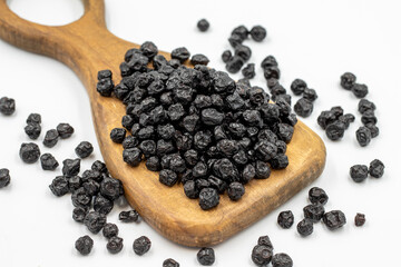 Dried blueberries isolated on a white background. Bulk blueberries. close up
