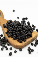 Dried blueberries isolated on a white background. Bulk blueberries. close up