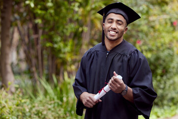 Turn your cant into cans and your dreaming into plans. Shot of a young man holding a certificate on...