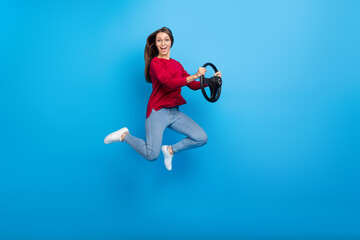 Full length photo of sweet young lady drive wear eyewear shirt jeans shoes isolated on blue...