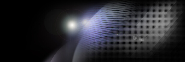 Spot lit perforated blue metal plate