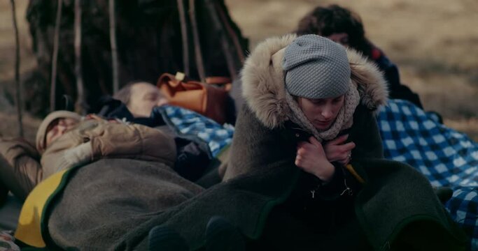 Refugee In Forest Feeling Cold During Russian-Ukrainian Crisis.