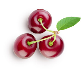 Three cherries on one stem with green leaf isolated on white background. Excellent retouching quality, full depth of field. View from above