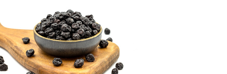 Dried blueberries isolated on a white background. Bulk blueberries. close up. Copy space. Space for text