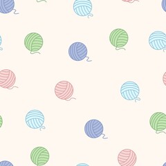 Seamless pattern of blue, green, pink, purple balls of thread. On a beige background.