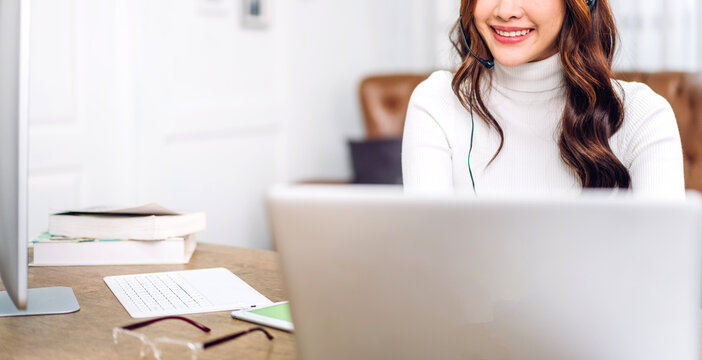 Woman talk speak using laptop computer working and video conference online meeting with colleagues at home.Creative woman talk video chat call with business team.work from home concept