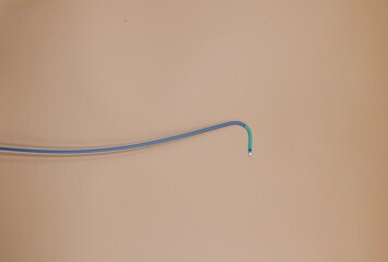 Angioplasty guiding catheter used to treat blockage in the arteries of heart . Image isolated on...