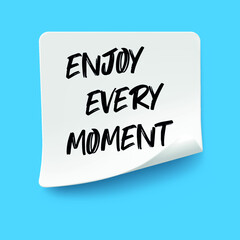 Enjoy every moment write on yellow Sticky Notes.
