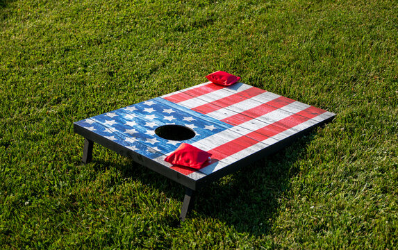 Corn hole game board painted as an American Flag