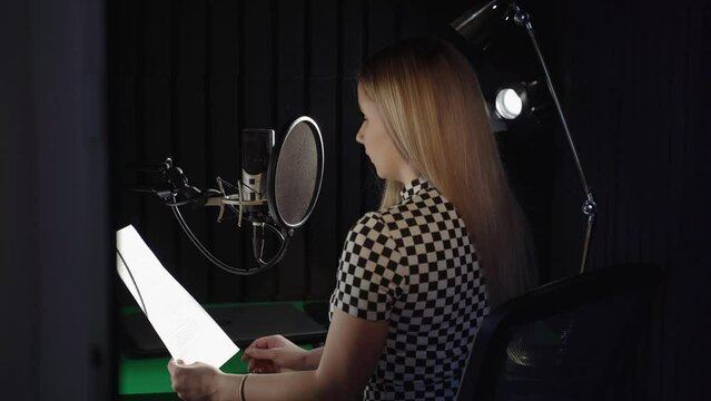 young journalist reading news in the studio