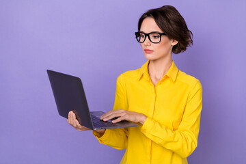 Photo of boss millennial lady look laptop wear formal cloth eyewear isolated on violet color background