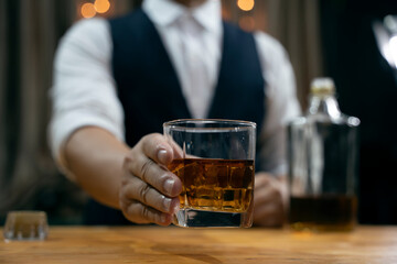 Barman pouring whiskey whiskey glass beautiful night