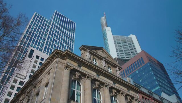 Historical old building of Frankfurt am main with commerzbank tower and skyscrapers in the financial district on a sunny day with blue sky