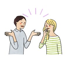 言葉が通じて楽しそうに会話している男女
