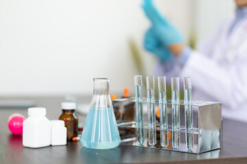 Science research concepts and inventing medical drugs. Experiments on liquid chemical reactions and biological extracts.